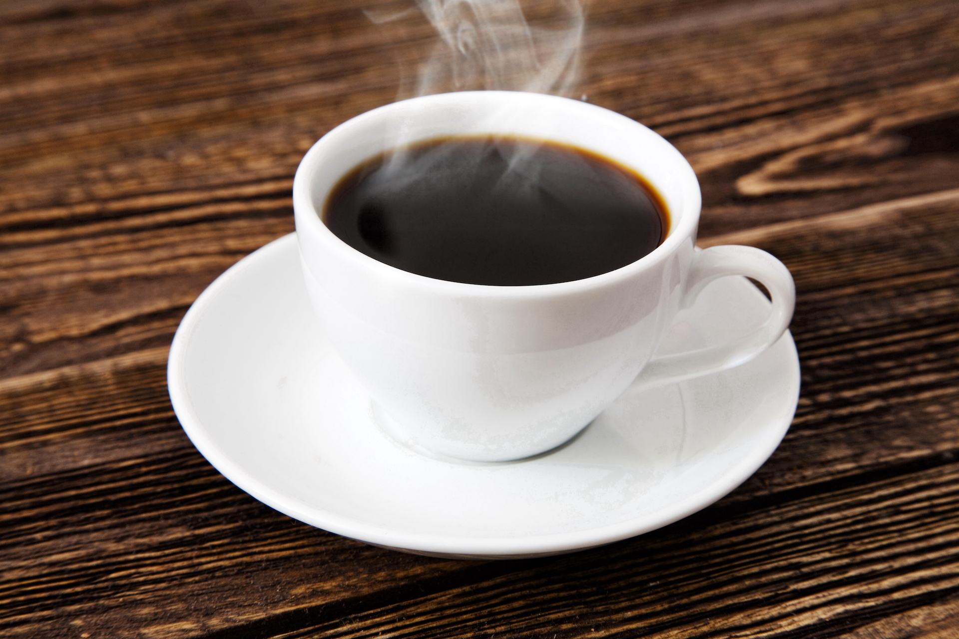 Cup of coffee on a wooden table